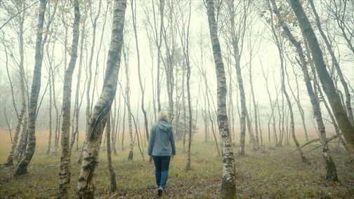 Person im Wald